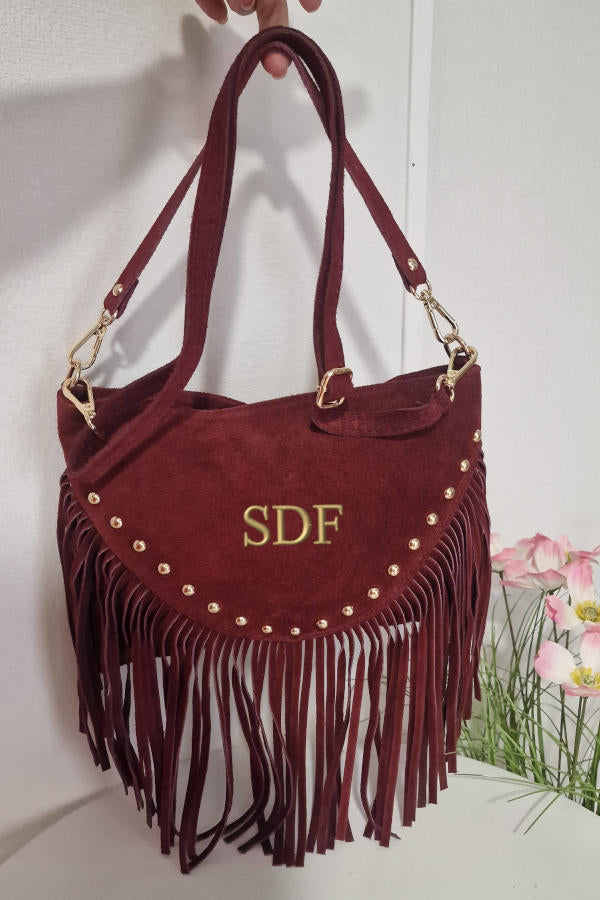 Bandolera granate con tachuelas