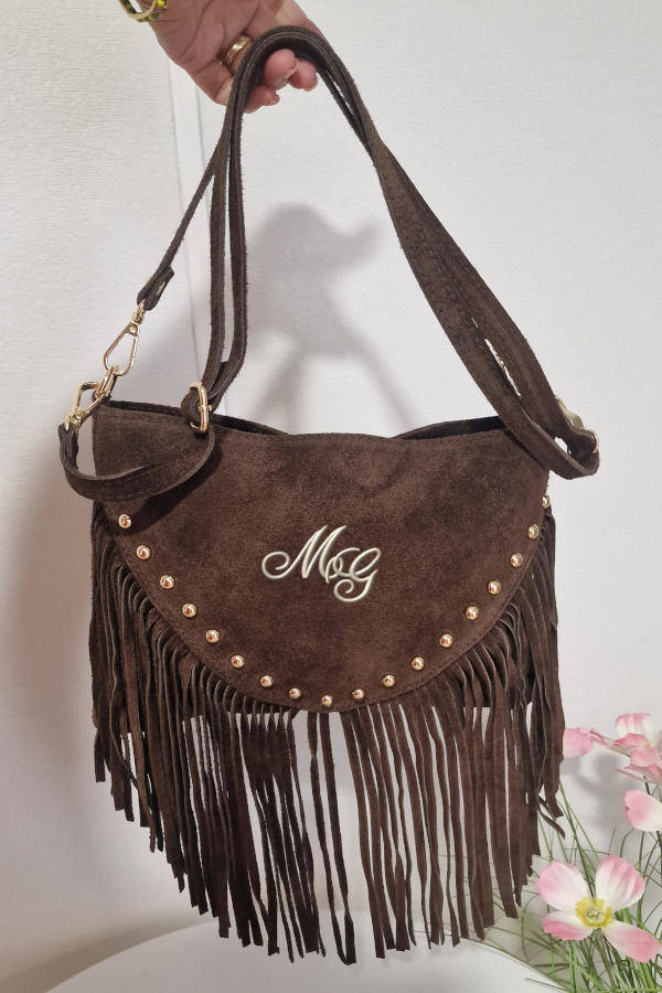Bandoleras de piel marrón con flecos