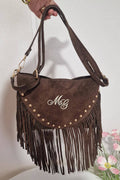 Bandoleras de piel marrón con flecos
