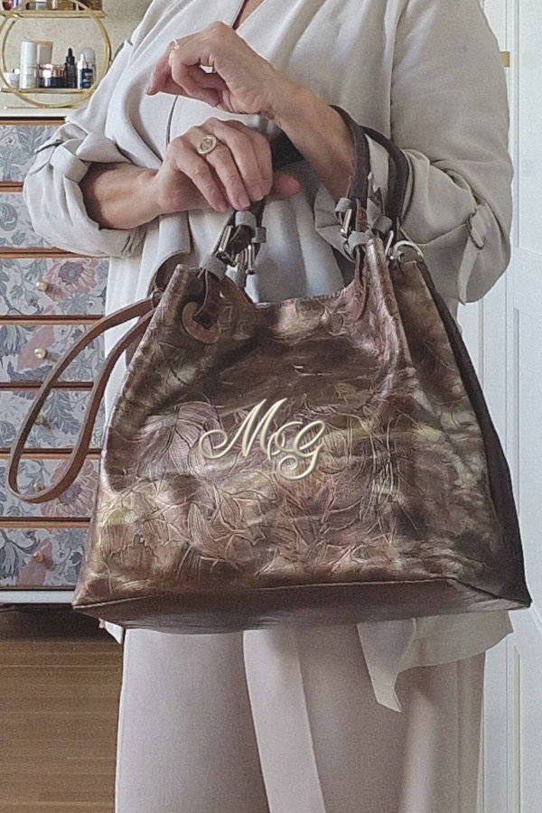 Bolso único desigual dorado