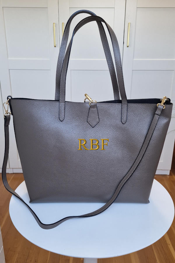 Bolso de piel personalizado con neceser